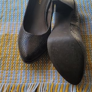 Olive Drab snakeskin platform heel pumps.